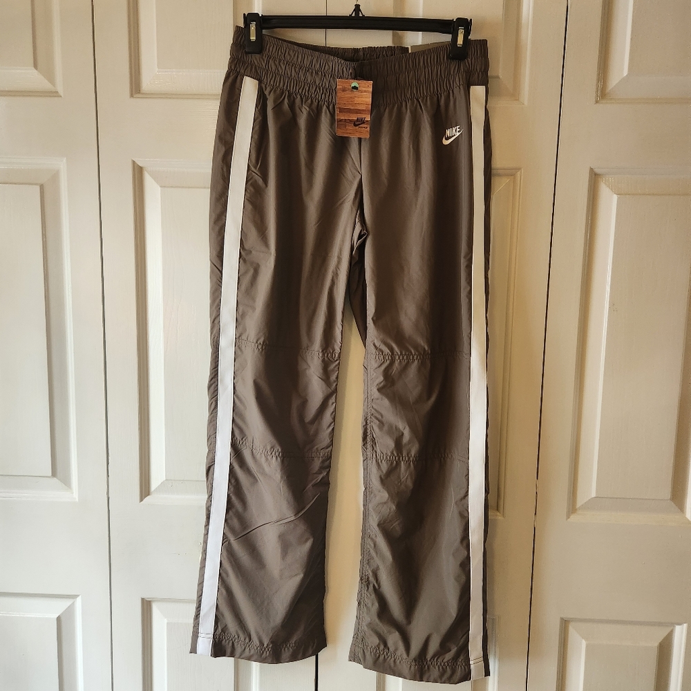 Nike Women's Perfect Fit Athletic Pants. Charcoal with White Stripe. Medium.